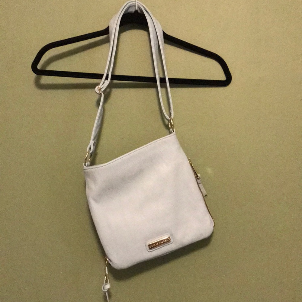 Steve Madden blue handbag.